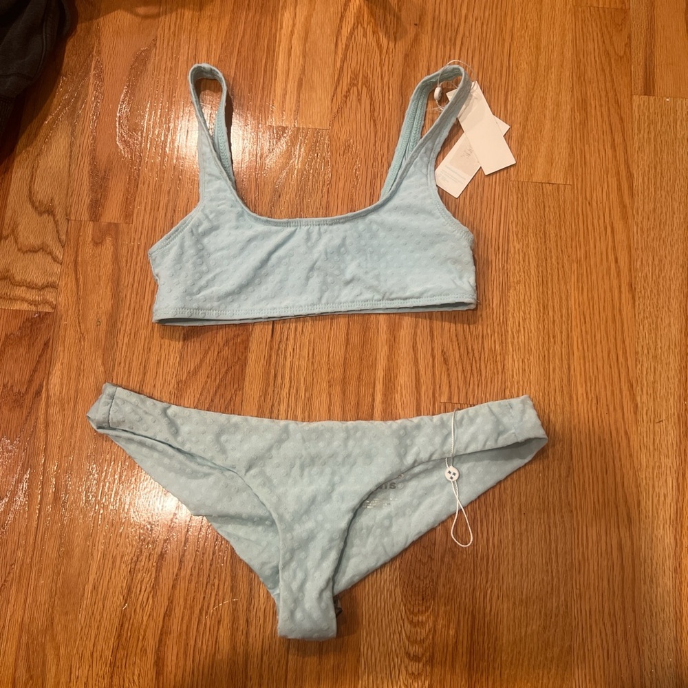 Light blue top and bottom from Frankie’s bikinis